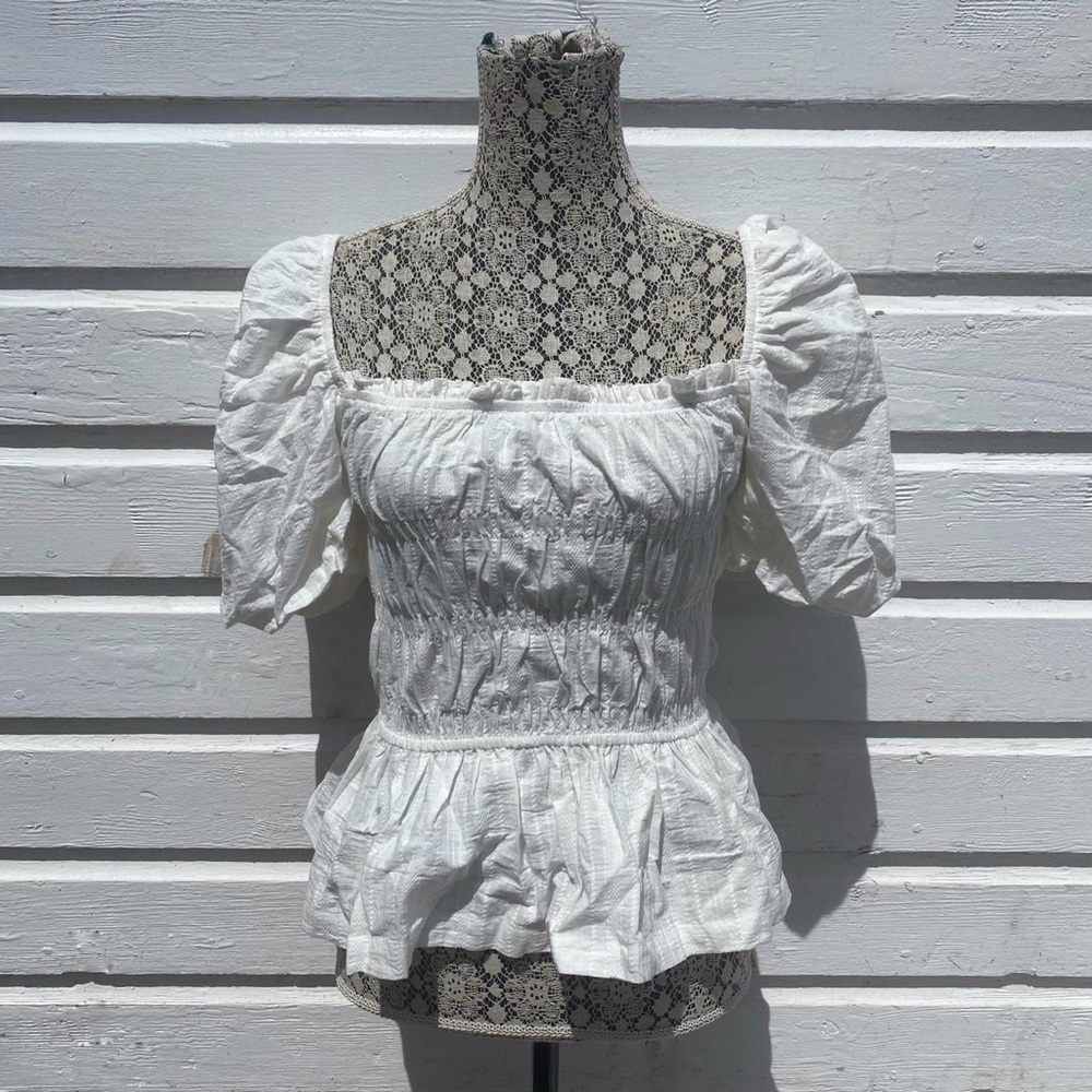 White peplum puff sleeve top